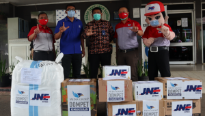 JNE Distribusikan 100 Ton Bantuan Covid-19 ke Seluruh Indonesia Selama Tahun 2020