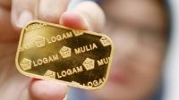 Emas Dunia Bersinar, Harga Emas Antam Kembali Naik Rp10 Ribu per Gram