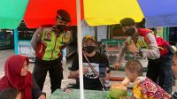 Samapta Polres Sukabumi Gencar Berikan Imbauan, Waspada Ada Covid-19 dan Lakalaut di Pantai