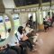 Penumpang duduk tanpa berjarak di dalam KRL Commuter