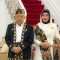 Wakil Presiden Ma'ruf Amin beserta Ibu Wury Ma'ruf Amin mengenakan pakaian adat dari provinsi