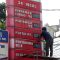 Petugas mengubah papan harga BBM