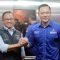 Ketua Umum Partai Demokrat Agus Harimurti Yudhoyono menyambut kedatangan Gubernur DKI Jakarta Anies