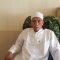 DIWAWANCARAI : Ketua II PPIH Kabupaten Sukabumi, KH. Ujang Hamdun saat diwawancarai Radar Sukabumi, soal biaya jamaah haji tahun 2023.(FOTO : DENDI/RADAR SUKABUMI)