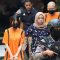 Personel Polres Sukabumi Kota saat menggiring dua Youtuber sebagai tersangka kasus promosi judi online. (Antara)
