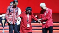 Megawati Soekarnoputri di hadapan Presiden Joko Widodo dan peserta Rakernas IV PDIP/Ist