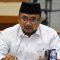 Menteri Agama Yaqut Cholil Qoumas menyampaikan paparan saat rapat kerja dengan Komisi VIII DPR di kompleks Parlemen, Senayan, Jakarta, Senin (18/9/2023).