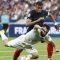 Pemain Prancis Kylian Mbappe berebut bola dengan pemain Yunani Manolis Siopis pada kualifikas Euro 2024 grup B di Stade de France, Saint-Denis, Prancis, Senin (19/6/2023). Gol tunggal Mbappe membawa kemenangan Prancis atas Yunani.(router)