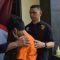 Pelaku penipuan modus rekrutmen kerja di perusahaan ternama dihadirkan petugas saat ungkap kasus di Mapolres Metro Bekasi, Selasa (3/10/2023). (Pradita Kurniawan Syah).