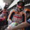 Pembalap Repsol Honda Marc Marquez (kedua kiri) dan Joan Mir (kanan) bersiap mengendarai motornya pada sesi latihan bebas 2 MotoGP seri ke-15 di Pertamina Mandalika International Street Circuit, Lombok Tengah, NTB, Jumat (13/10/2023).  (ANTARA FOTO/WAHYU PUTRO A)