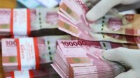 Rupiah Anjlok ke Level Rp 15.575 per Dolar AS