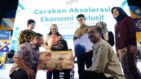 TINGKATKAN INKLUSIVITAS: SVP Retail Deposit Products and Solution Bank Mandiri Evi Dempowati dalam acara Gerakan Akselerasi Ekonomi Inklusif di Plaza Mandiri, Jakarta pada Selasa (21/11). (Ist