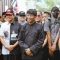 Mahfud Md. menyapa masyarakat dalam kunjungannya ke Bandung, Jawa Barat, Minggu (10/12/2023). (Tim Media Mahfud)