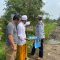 SURVEI : Sekretaris MUI Kabupaten Sukabumi, KH. Ujang Hamdun, saat meninjau tanah yang rencananya akan dibangun untuk gedung MUI Kabupaten Sukabumi di Jalur Lingkar Selatan, tepatnya di seberang Masjid Raya Raudhatul Irfan, Desa Cibolang Kaler, Kecamatan Cisaat, Kabupaten Sukabumi.(FOTO : UNTUK RADAR SUKABUMI)