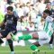 Real Madrid's Spanish forward #21 Brahim Diaz (L) fights for the ball with Real Betis' Moroccan defender #28 Chadi Riad during the Spanish league football match between Real Betis and Real Madrid CF at the Benito Villamarin stadium in Seville on December 9, 2023. (Photo by CRISTINA QUICLER / AFP) (AFP/CRISTINA QUICLER)