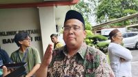 Ketua Badan Pengawas Pemilu (Bawaslu) RI Rahmat Bagja menjawab pertanyaan awak media di Kantor Bawaslu RI, Jakarta, Jumat (16/2/2024).