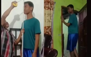 Sagil Muhammad Rizki usia 12 tahun atau kelas 6 SD di Jambi memiliki tinggi 2 meter. (ist)