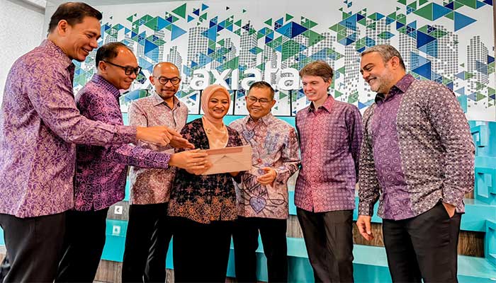 XL Axiata Bagi Dividen