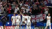 Momen selebrasi skuad Inggris untuk gol Jude Bellingham ke gawang Serbia, Euro 2024 (c) AP Photo/Frank Augstein
