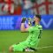 Penjaga gawang Georgia Giorgi Mamardashvili merayakan keberhasilan timnya lolos ke fase gugur Euro 2024 dengan menumbangkan Portugal dalam laga Grup F di Arena AufSchalke, Gelsenkirchen, pada 26 Juni 2024. (AFP/Patricia De Melo Moreira)