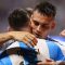 Lautaro Martinez dari Argentina melakukan selebrasi setelah mencetak gol kedua tim bersama Lionel Messi dari Argentina pada pertandingan grup A CONMEBOL Copa America antara Argentina dan Kanada di Stadion Mercedes-Benz pada Kamis (20/6/2024) di Atlanta, Georgia. (Getty Images/AFP)
