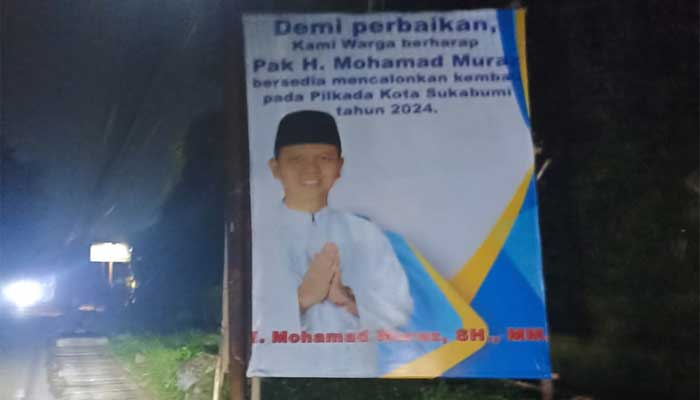 Baliho bergambar Mohamad Muraz