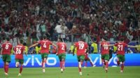Selebrasi para pemain Portugal usai menang adu penalti melawan Slovenia di babak 16 besar (c) AP Photo/Ebrahim Noroozi