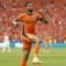 Penyerang Belanda Cody Gakpo merayakan gol pertama timnya pada pertandingan sepak bola Grup D UEFA Euro 2024 antara Belanda dan Austria di Olympiastadion di Berlin pada Selasa (25/6/2024). (AFP/Odd Andersen)