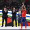Rodri mengangkat trofi Pemain Terbaik Euro 2024 setelah laga final Spanyol melawan Inggris di Olympiastadion, Berlin, Jerman, 14 Jili 2024. (AFP/ADRIAN DENNIS)