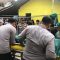 Petugas Kepolisian saat hendak mengevakuasi jenazah korban usia dilakukan autopsi di Rumah Sakit Kramat Jati pada Jumat (11/10) sore.