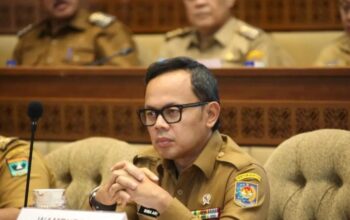 Wakil Menteri Dalam Negeri Bima Arya Sugiarto dalam rapat dengar pendapat bersama Komisi II DPR RI di Kompleks Parlemen Senayan, Jakarta, Senin (18/11/2024). (Puspen Kementerian Dalam Negeri)
