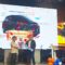 MERIAH: Pinca BRI Sukabumi, Duta Okki Wicaksono (kanan) menyerahkan secara simbolis hadiah grand prize PHS Periode 1 Maret-31 Agustus 2024 berupa satu unit mobil New Avanza kepada pemenang yang diwakili oleh Kepala Unit BRI Gegerbitung Sukabumi, A Rizwan /Septiana di Sapa Cafe Sukabumi pada Sabtu (7/12/2024). (sri)