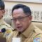 Menteri Dalam Negeri Muhammad Tito Karnavian dalam Rapat Kerja yang digelar Komisi II DPR RI di Kompleks Parlemen, Senayan, Jakarta, Senin (3/2/2025). (Narda Margaretha Sinambela)