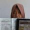 Seorang warga memperlihatkan bukti pelunasan pajak kendaraan bermotor yang dibayar secara daring atau online dari rumah di Panarukan, Situbondo, Jawa Timur. (Seno)