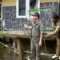 Kepala BNPB Suharyanto meninjau lokasi jembatan yang amblas terdampak banjir bandang di Desa Tugu Selatan, Kecamatan Cisarua, Kabupaten Bogor, Jawa Barat, Senin (3/3/2025). (BNPB)