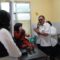 Kepala DPPKB Kabupaten Sukabumi, Uus Pirdaus, bersama jajaranya saat meninjau warga untuk pelayanan KB dan Kesehatan reproduksi di Puskesmas Warungkiara.