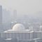 Masjid Istiqlal yang tertutup polusi di Jakarta, Jumat (21/6/2024).