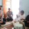 Kepala Kepolisian Resor Garut AKBP Yugi Bayu Hendarto saat menyerahkan Surat Keputusan Kenaikan Pangkat Anumerta Almarhum Aipda Cecep Saepul Bahri kepala keluarga almarhum di rumah duka Perum Guntur Residence, Garut Kota, Kabupaten Garut, Jawa Barat, Sabtu (19/7/2025). (Polres Garut)