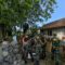 Warga dan TNI kompak bergotong royong membangun saluran drainase di Kampung Cikembar, Jumat (4/7/2025).