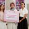 Tia Maulidiya PR Manager BNB handover donations books to Yuli Andyono Managing director Bookhive n Bunga Fitra, Ketua IWK Fakultas Ilmu Budaya Universitas Indonesia. (ist)