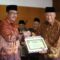 SAMBUTAN : Bupati Sukabumi, Asep Japar saat memberikan sambutan pada HUT PWRI Kabupaten Sukabumi ke 63 di Gedung Pendopo Sukabumi pada Senin (13/10).