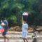 Warga korban bencana banjir dan tanah longsor membawa bantuan di Kelurahan Huta Nabolon, Kecamatan Tukka,Tapanuli Tengah, Sumatera Utara, Minggu (7/12/2025). 
