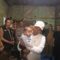 FOTO: Kepala DPPKB Kabupaten Sukabumi, Eka Nandang bersama Bupati Sukabumi, Asep Japar, mendampingi Menteri Kependudukan dan Pembangunan Keluarga RI saat meninjau rumah tidak layak huni (Rutilahu) di Kecamatan Kabandungan, Senin (12/1/2026).