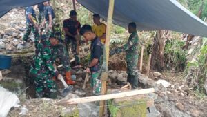 Satgas TMMD Ke-127 Kodim 0624 Bersama Warga Pasang Pondasi Pembangunan Bak Penampungan Air