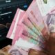 IHSG Menguat Hampir 2 Persen, Rupiah Ikut Naik Tipis