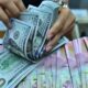 IHSG Rontok 113 Poin, Rupiah Jatuh ke Rp18.014