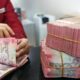 Rupiah Anjlok, APBN dan Konsumen Jadi Beban