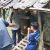 Ato (51) warga kampung Mekarjaya Desa Cikangkung, kecamatan Ciracap, Kabipaten Sukabumi Saat mendapat bantuan makanan dan sembako.